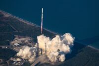 Blue Origin New Glenn rocket rises from pad, as seen from above